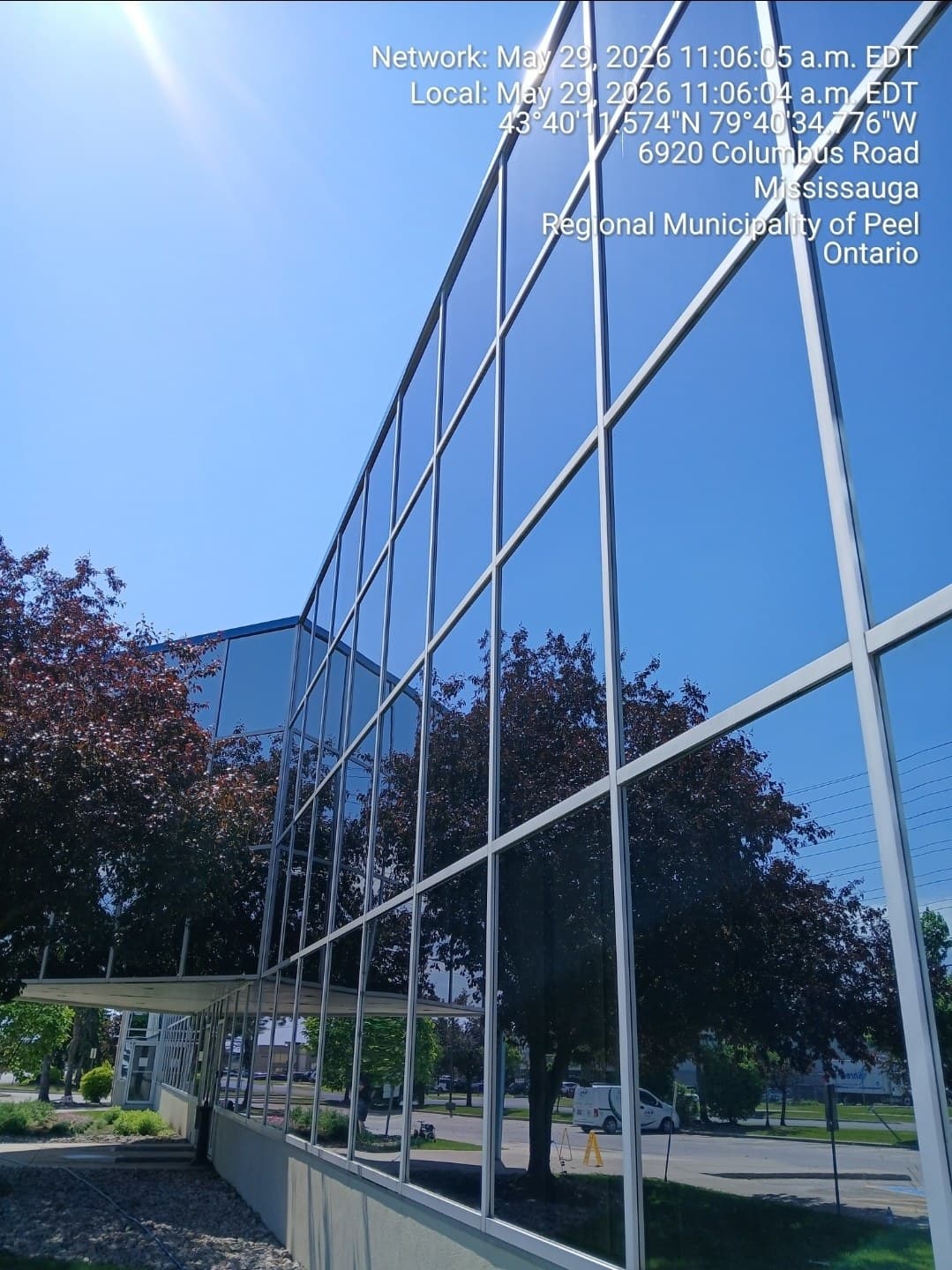 Reflective curtain wall glass cleaned to a streak-free shine