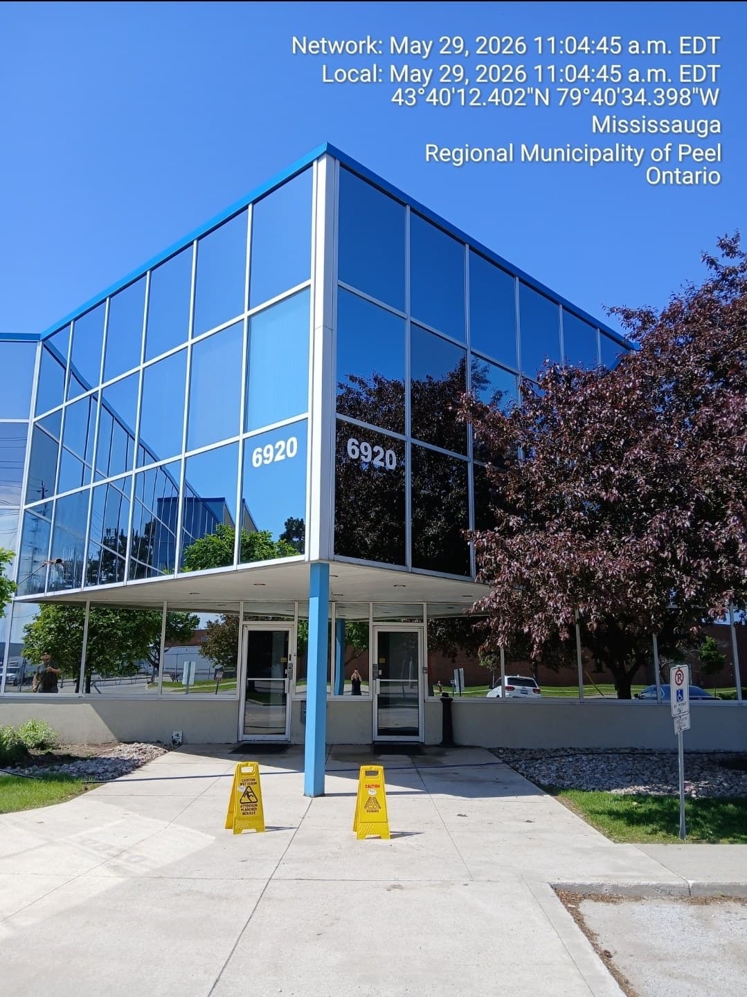 Commercial building entrance with clean glass panels