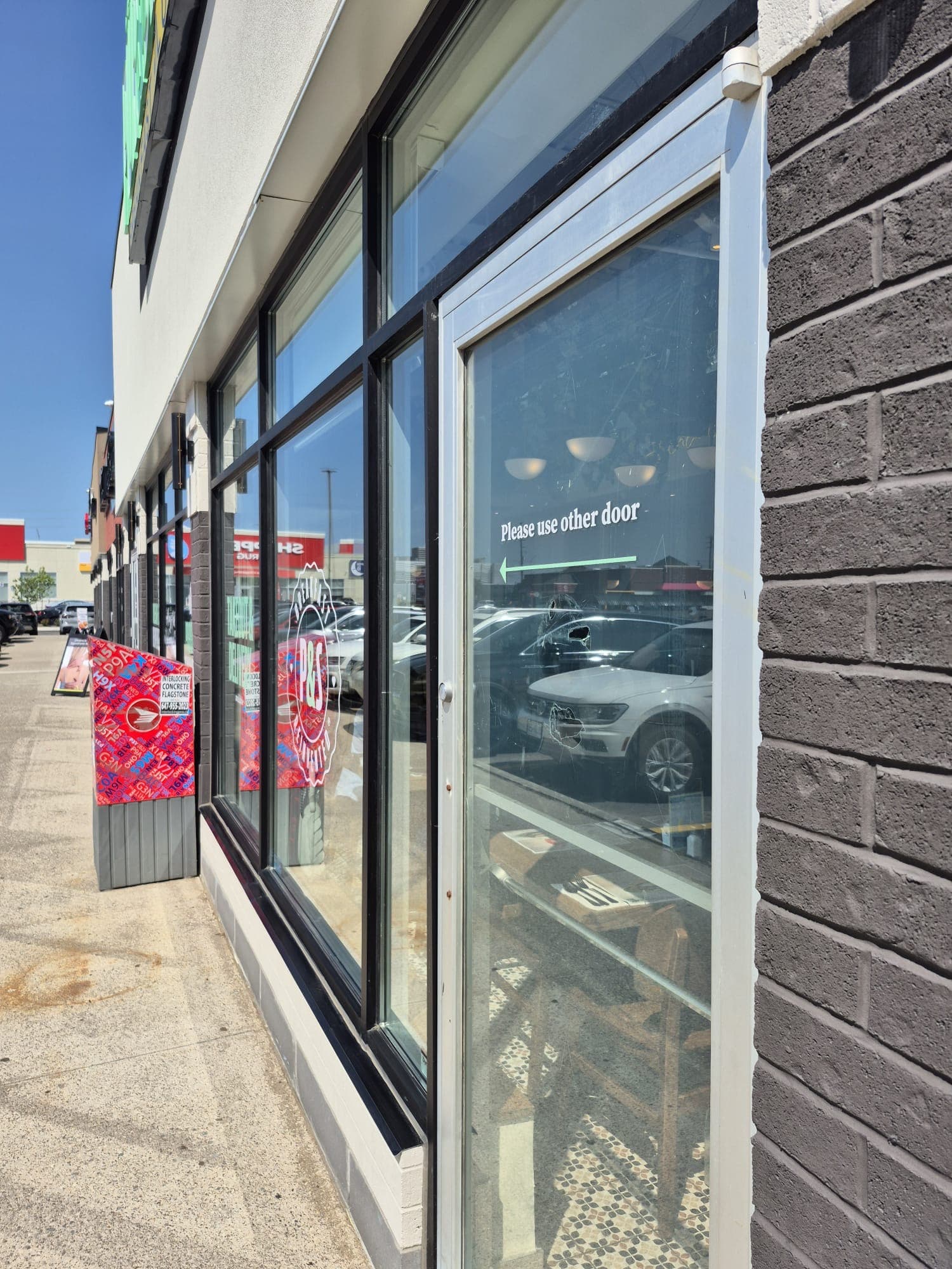 Storefront entrance with spotless glass doors